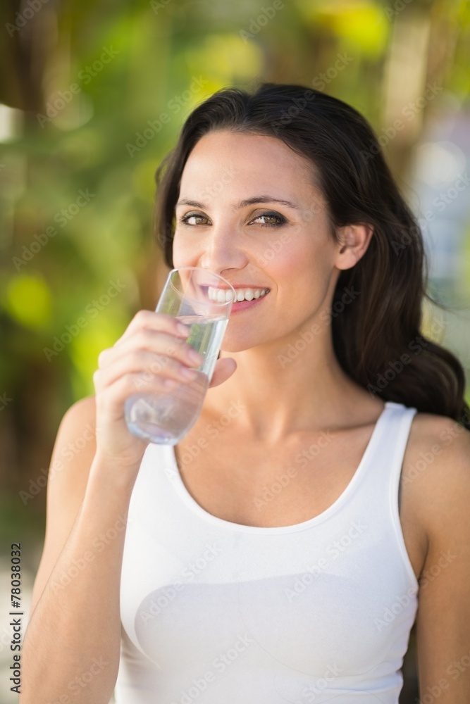 Pretty brunette drinking glass of water Pretty brunette drinking glass of water