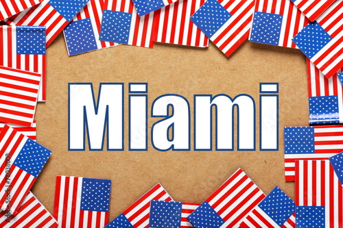 The name Miami with a border of USA Flags
