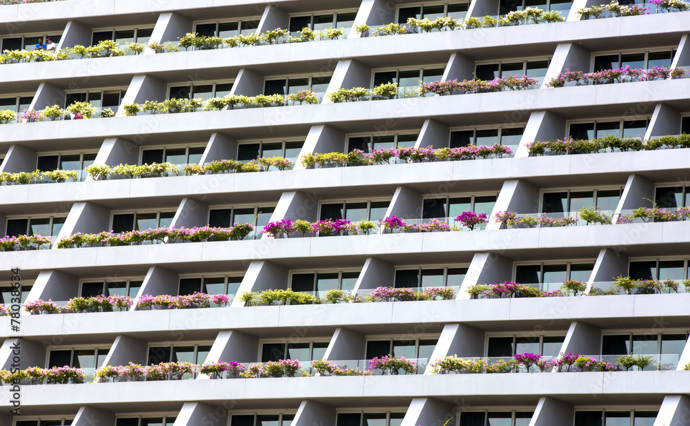 floors of high-rise building with windows and balconies