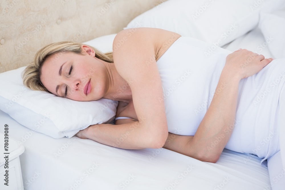 Pretty blonde woman sleeping in bed Pretty blonde woman sleeping in bed