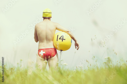 Fotografie swiss waterpolo player on the grass ( not in the water )
