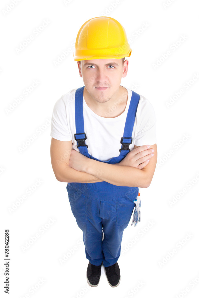 full length portrait of handsome man builder in blue uniform is full length portrait of handsome man builder in blue uniform is