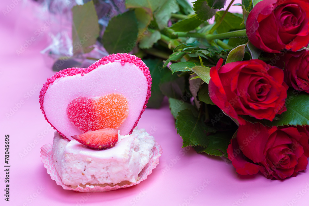 Valentine's day cake and roses on a pink background Valentine's day cake and roses on a pink background
