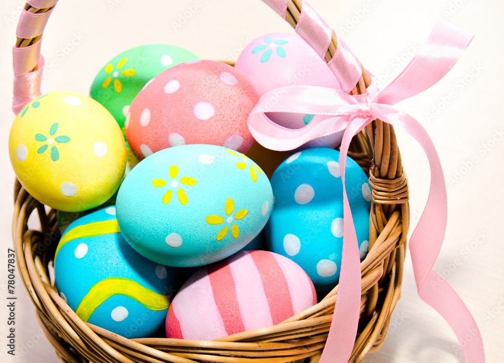 Colorful handmade easter eggs in the basket Colorful handmade easter eggs in the basket