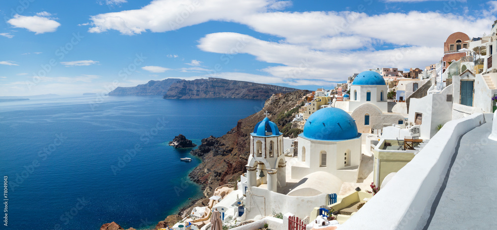 Panoramic view of the Oia village - obrazy, fototapety, plakaty 