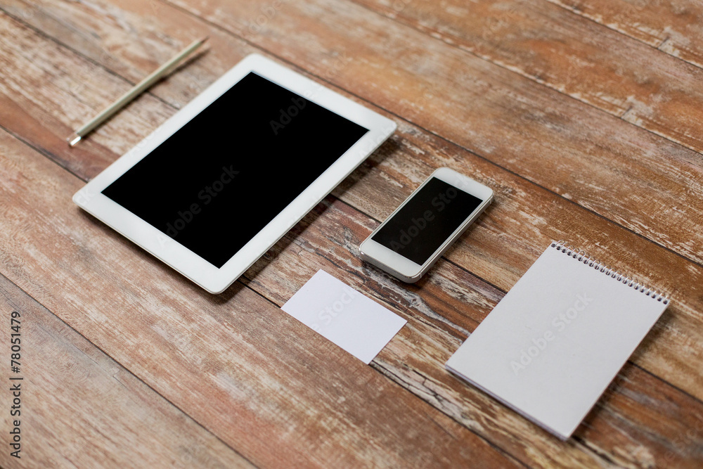 close up of notebook, tablet pc and smartphone close up of notebook, tablet pc and smartphone