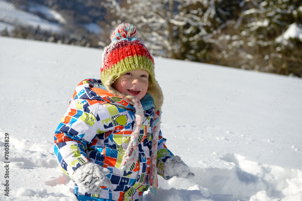 little 3 year old child playing in the snow little 3 year old child playing in the snow