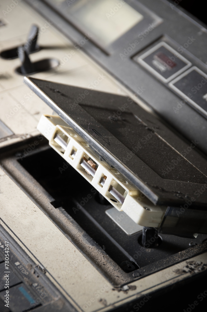 Cassette tape with old player. Cassette tape with old player.