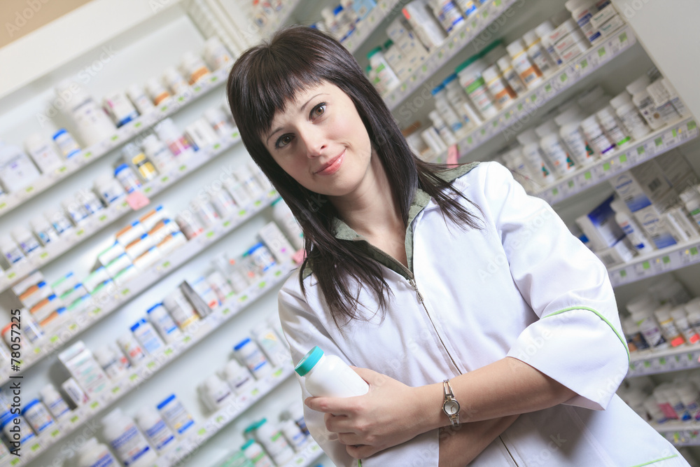 A Woman pharmacist at the pharmacy place