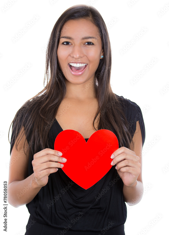 Beautiful young happy smiling woman holding red heart in love Beautiful young happy smiling woman holding red heart in love