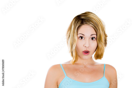Closeup portrait of surprised beautiful blonde woman 
