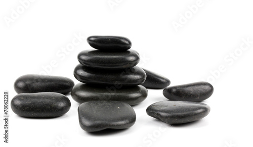 Black spa stones isolated on white