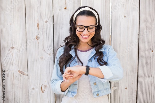 Pretty hipster checking the time photo