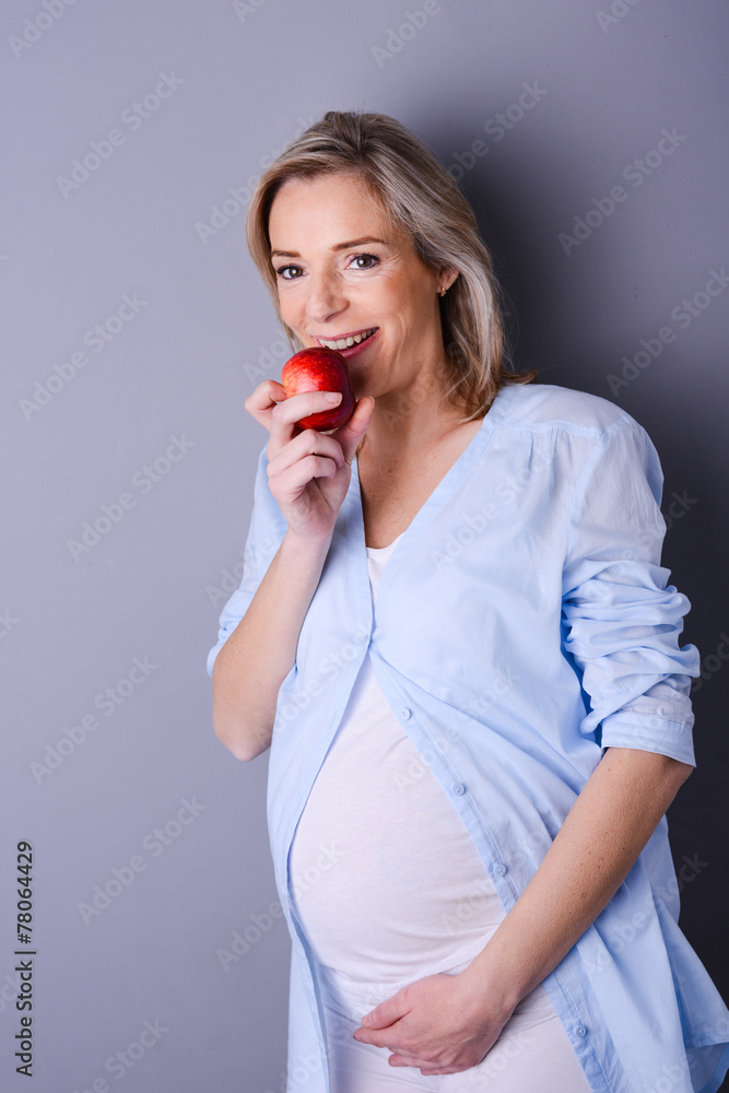 beautiful healthy forty years old pregnant woman eating apple beautiful healthy forty years old pregnant woman eating apple