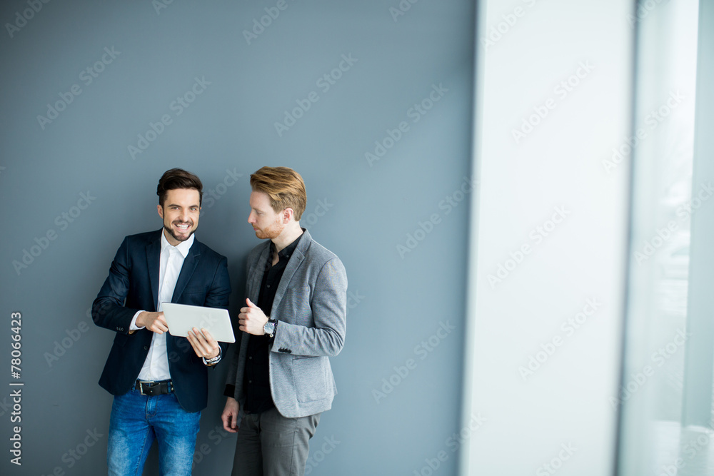 Young men with tablet Young men with tablet