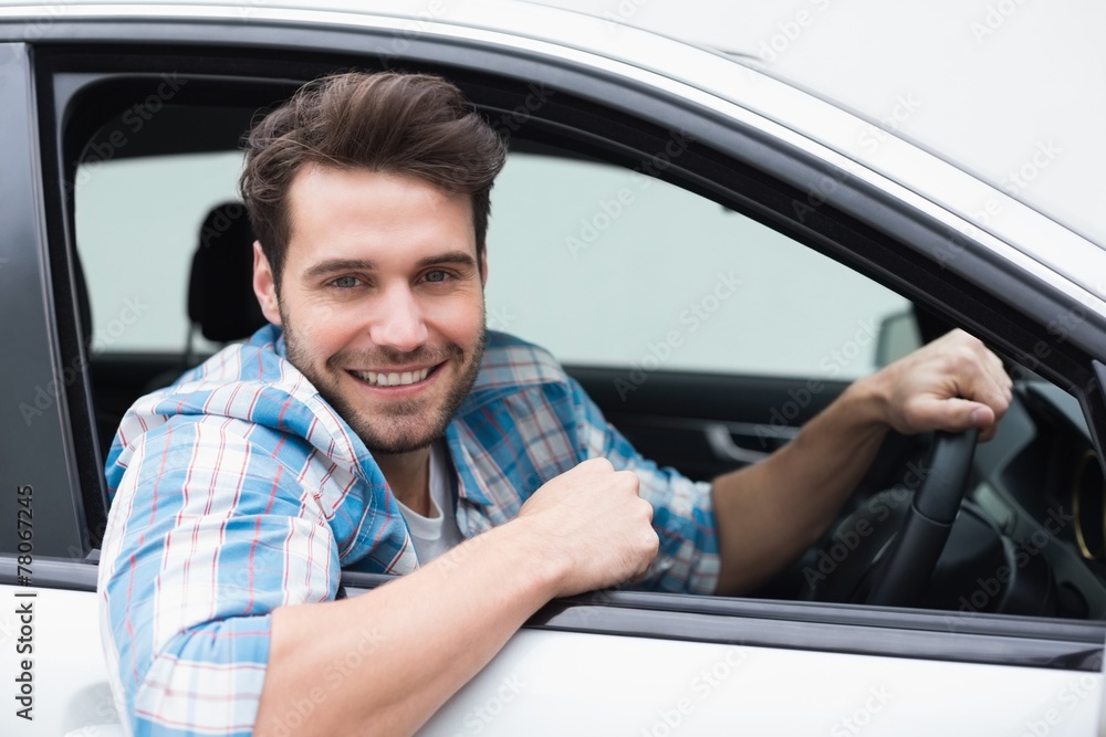 Young man smiling at camera Young man smiling at camera