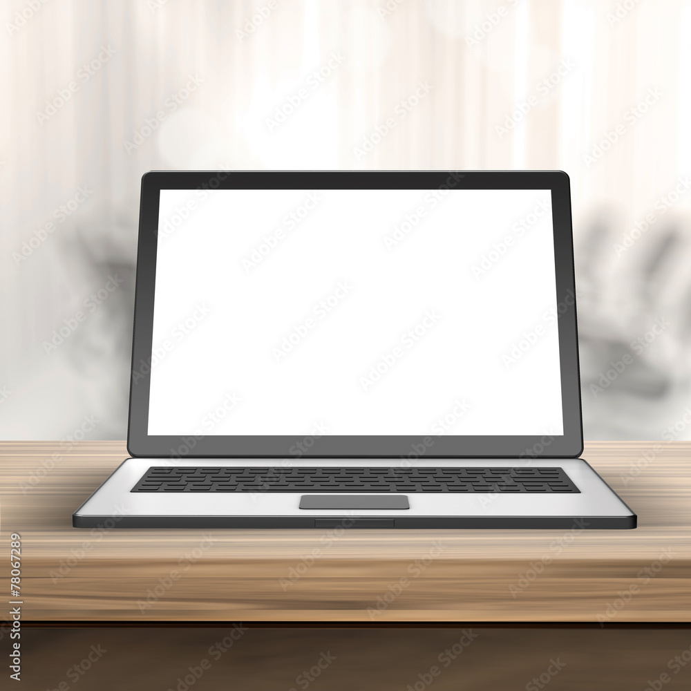 Laptop with blank screen on wood table and blurred background Laptop with blank screen on wood table and blurred background