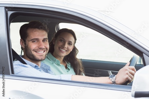 Young couple smiling at the camera © WavebreakMediaMicro