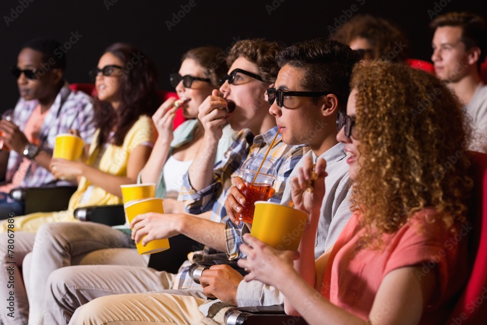 Young friends watching a 3d film Young friends watching a 3d film