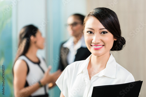 Free Download Chinese Business woman in front of team - GFXLoad