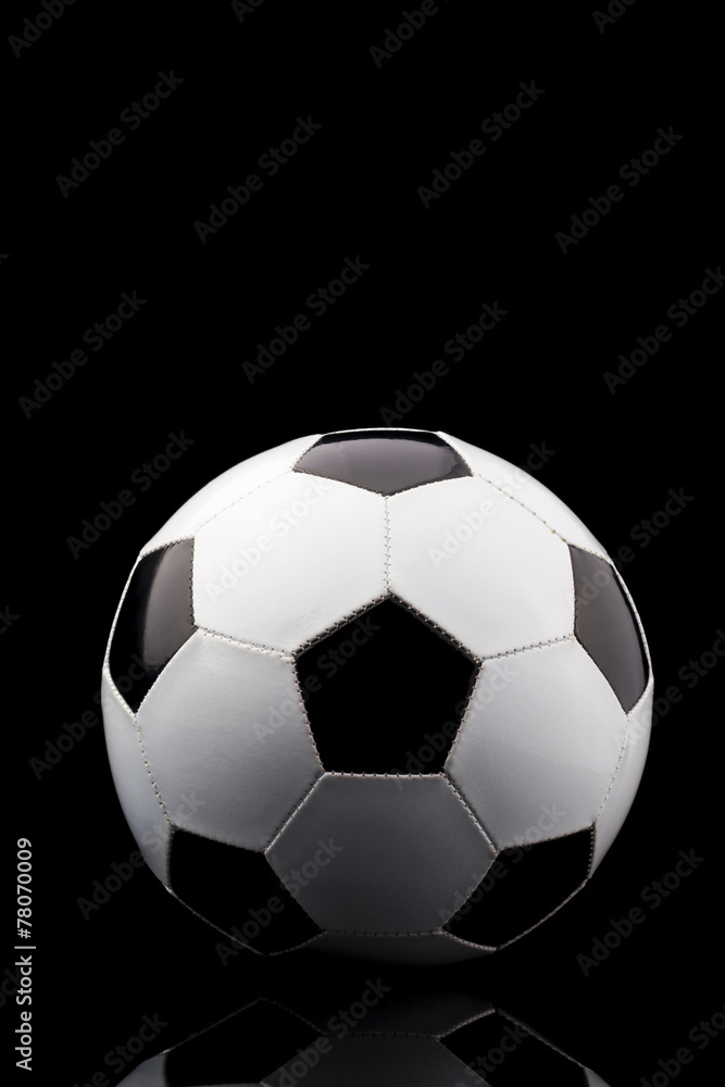 soccer ball on black background