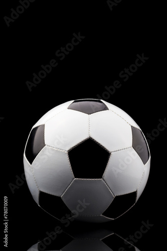 soccer ball on black background