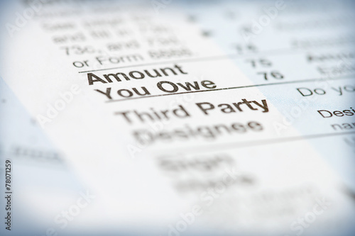 Taxes: Focus on Amount You Owe Section Of 1040 Tax Form