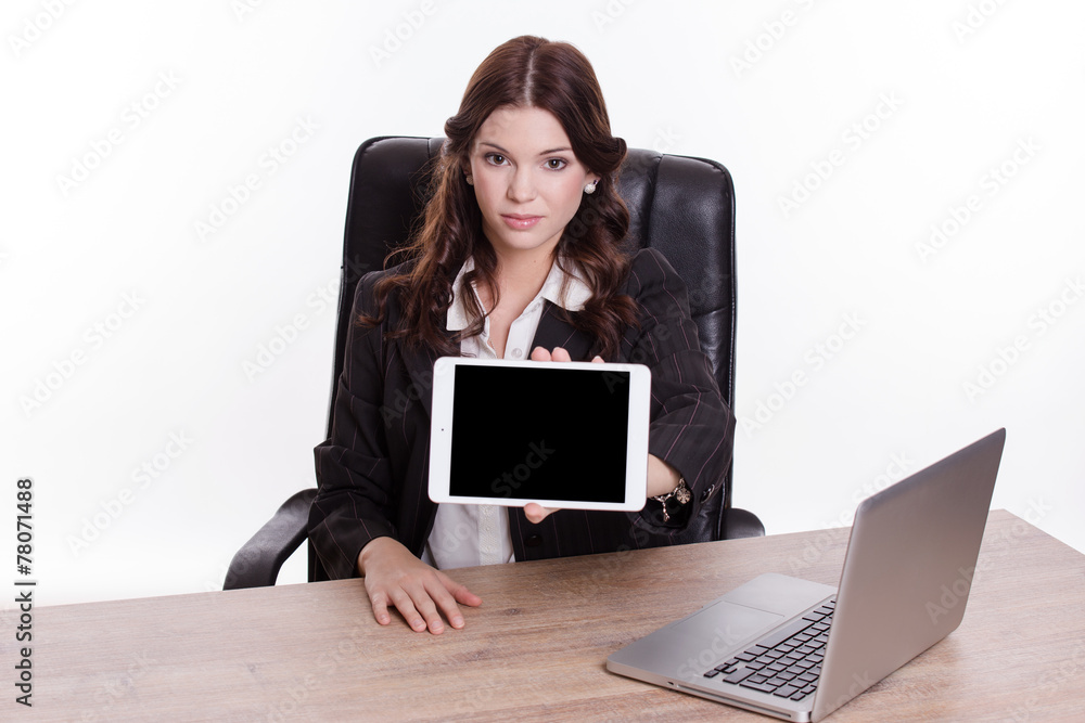 Business woman show the tablet in the office Business woman show the tablet in the office