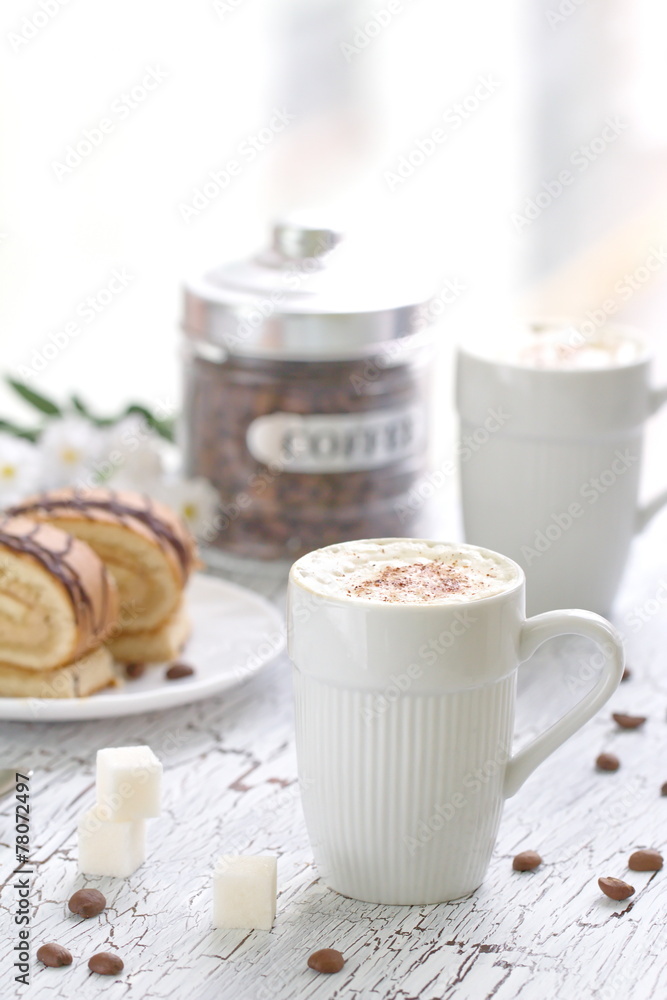 Cup of Cappuccino and cake Cup of Cappuccino and cake