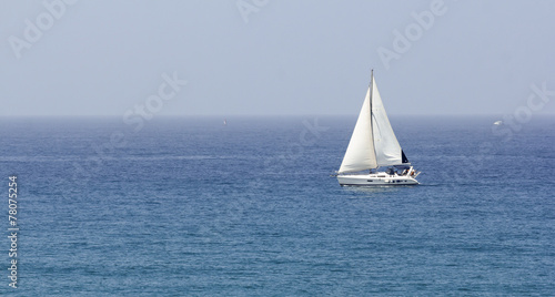 boat with white sails