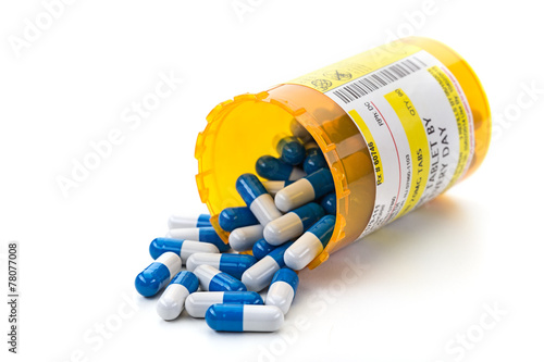 Prescription medication in pharmacy vials photo