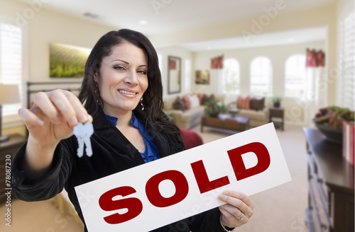 Hispanic Woman with Keys an...