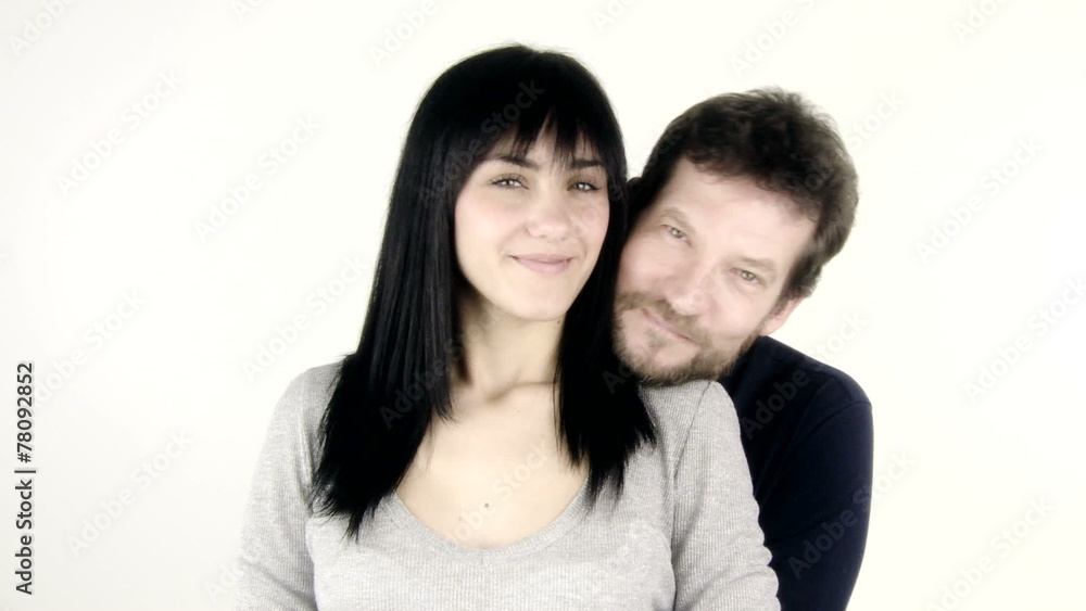 happy couple smiling and hugging isolated happy couple smiling and hugging isolated