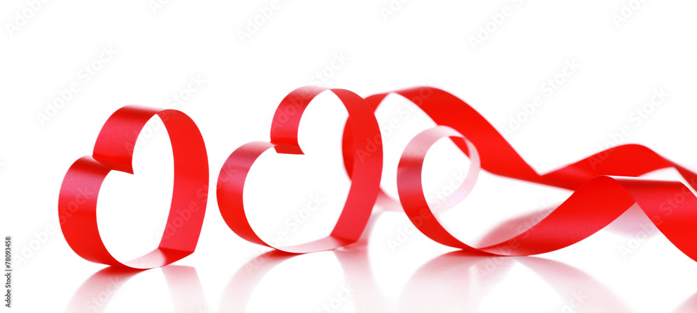 Red ribbons in shape of hearts isolated on white Red ribbons in shape of hearts isolated on white