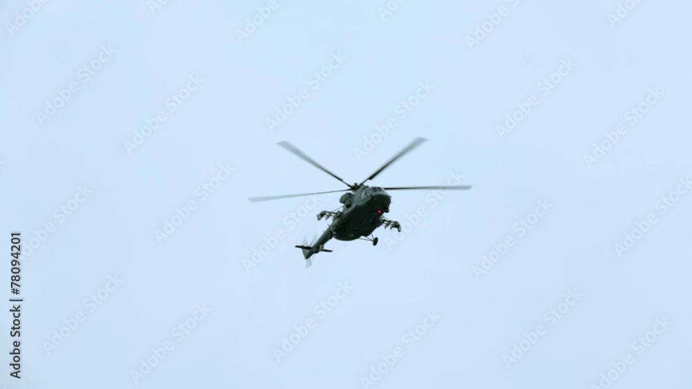 One helicopter flying in the sky during military parade One helicopter flying in the sky during military parade