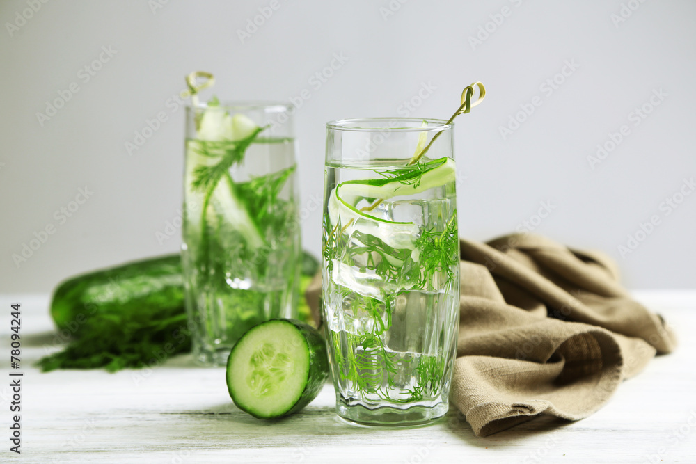 Glasses with fresh organic cucumber water Glasses with fresh organic cucumber water