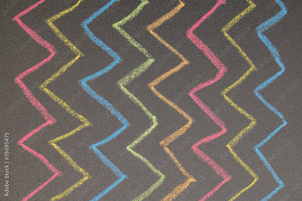 Hand drawn zig zag lines on chalkboard background Hand drawn zig zag lines on chalkboard background