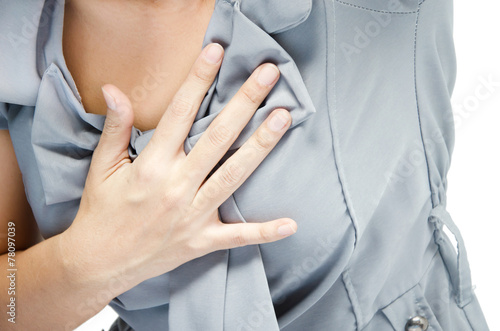 close up woman having chest pain heart attack
