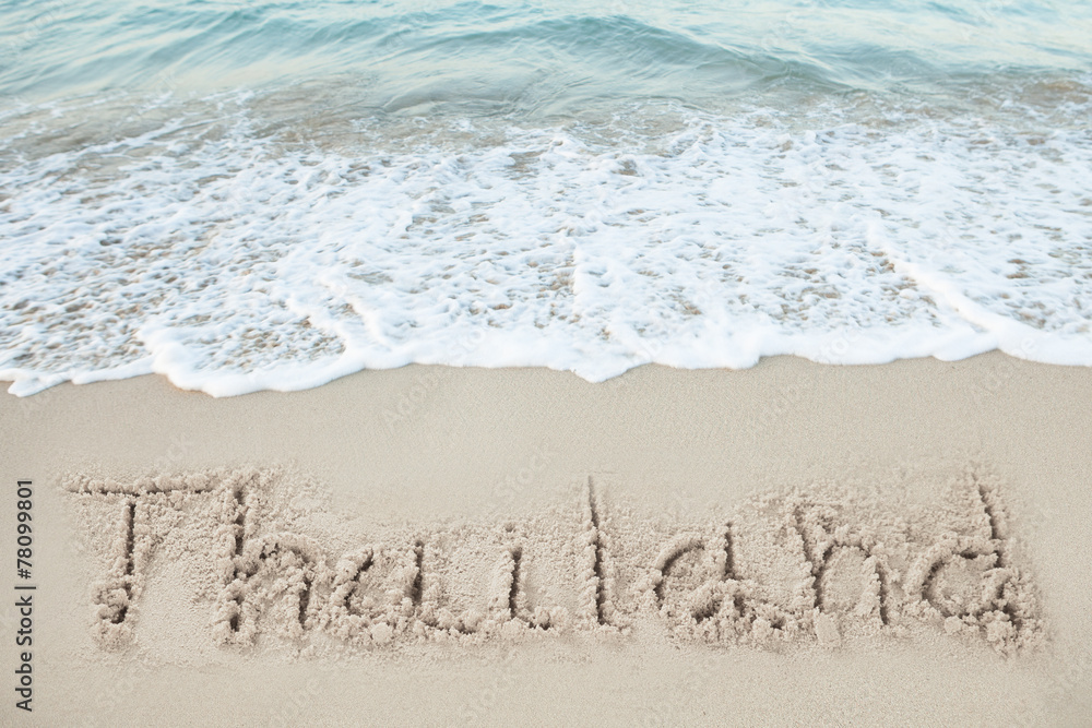 Fototapeta premium Thailand Written On Sand By Sea