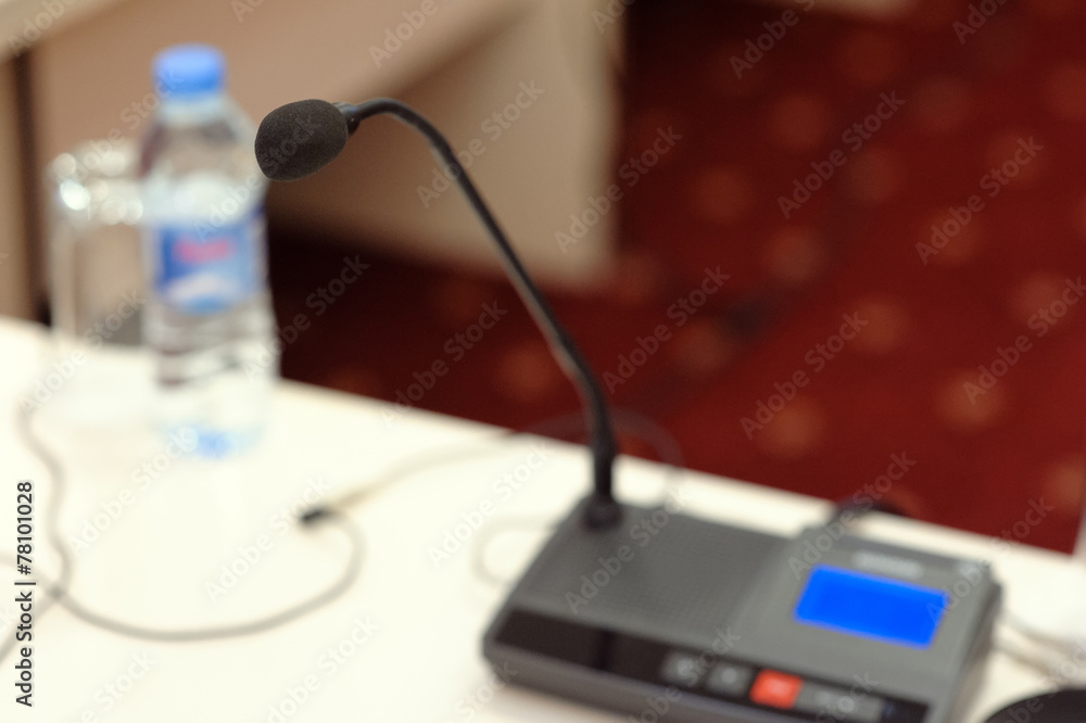 microphone against the background of convention center microphone against the background of convention center