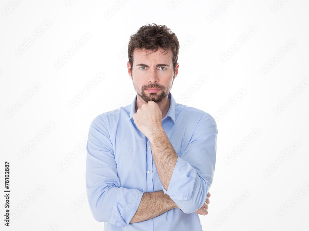 portrait of resolute man with fist on chin portrait of resolute man with fist on chin