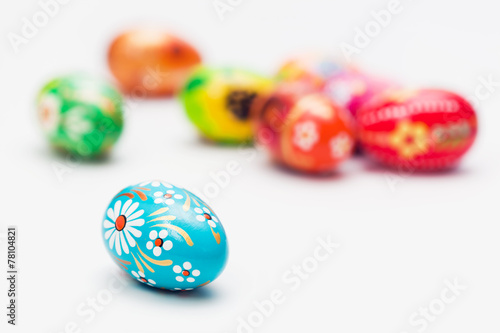 Handmade Easter eggs on white. Spring patterns art, unique.