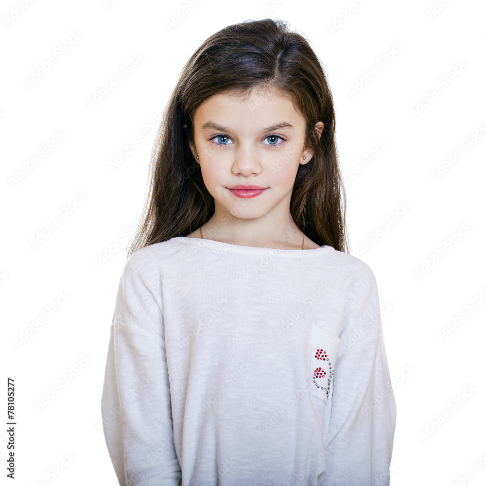 Portrait of a charming little girl smiling at camera