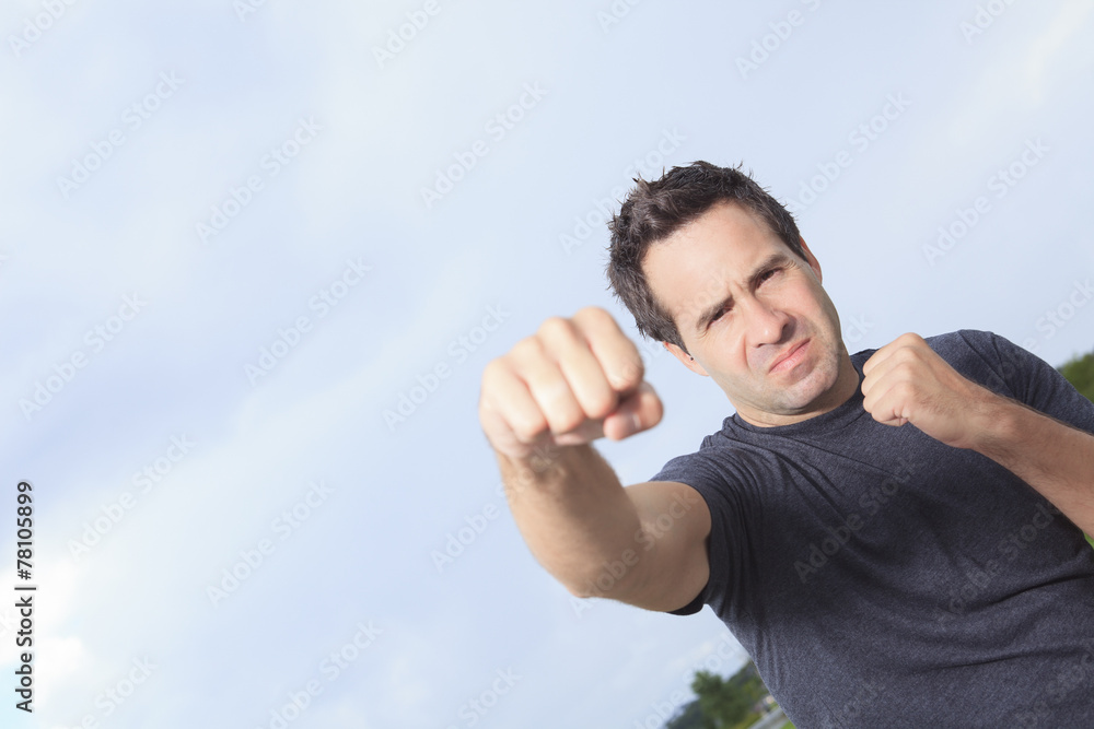 A portrait of an angry man who looks like he is up to start a fi A portrait of an angry man who looks like he is up to start a fi