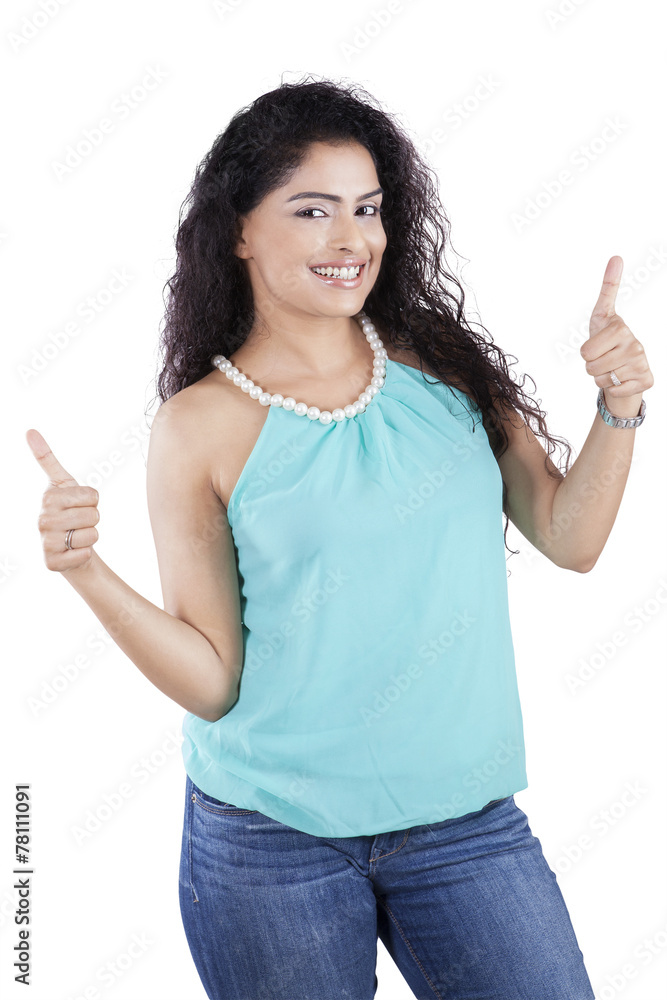 Asian woman with curly hair and thumbs up Asian woman with curly hair and thumbs up