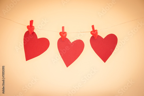 Paper hearts hanging on a rope, with vignette photo