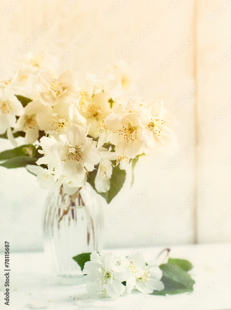 Jasmine flowers in a glass vase Jasmine flowers in a glass vase