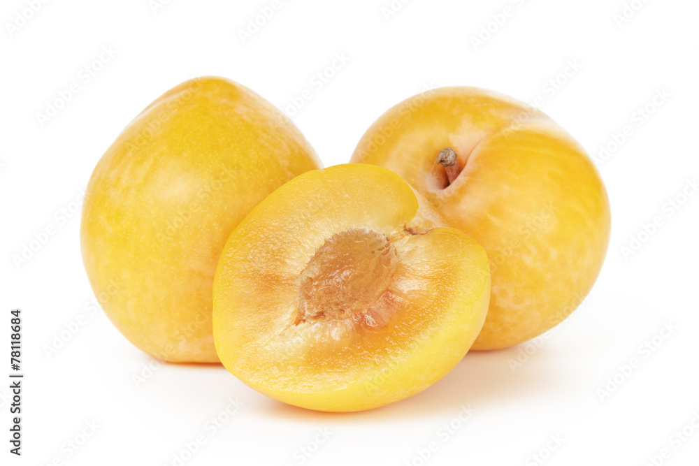 three ripe yellow plums three ripe yellow plums