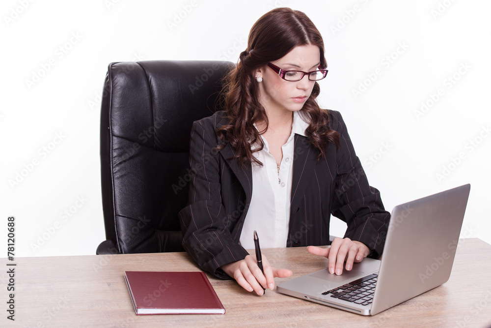 Business woman read on the laptop in the office Business woman read on the laptop in the office