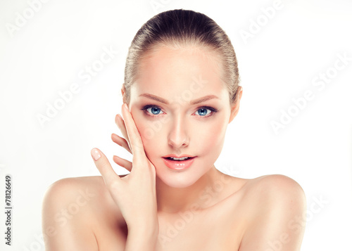 Beautiful Young Woman with Clean Fresh Skin close up